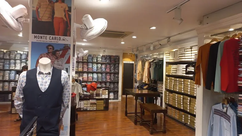 Folded garments and fabric shelves display